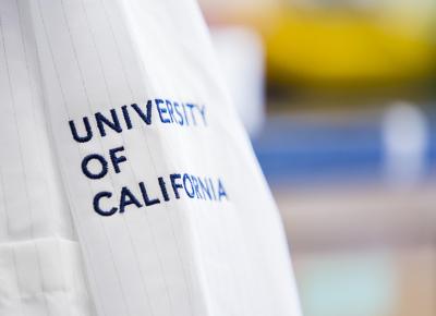 Close-up of a University of California labcoat